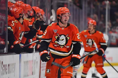 Anaheim Ducks forward Mason McTavish reacts after scoring goal in 2025 game.